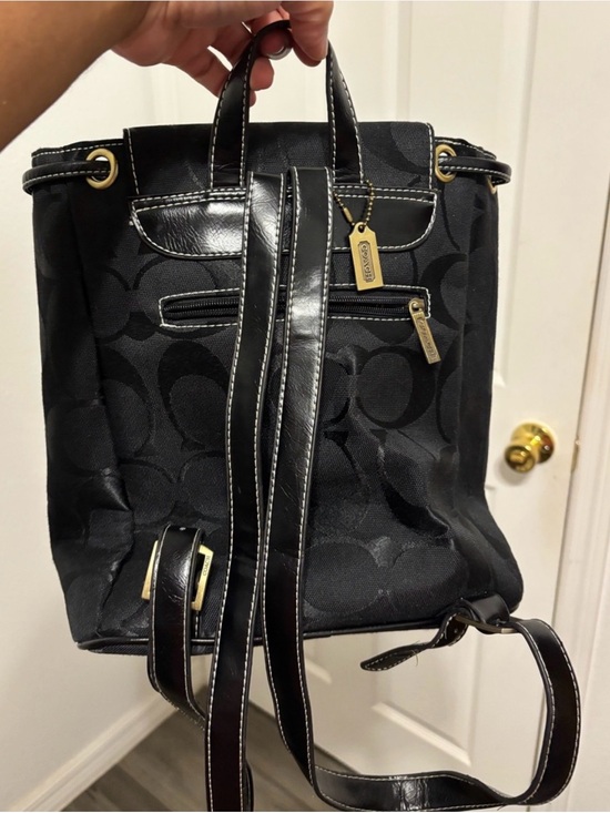 black backpack purse coach Disney x Mickey Mouse Charlie in Smooth Leather B Essex Fashion House seamlessly combining luxury with everyday use Coach Black Leather Campus Backpack